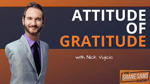 "Nick Vujicic speaking at a motivational seminar"